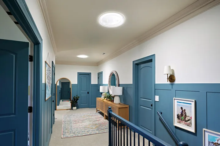 VELUX Sun Tunnel installed in a laundry-room ceiling, reading like a recessed light.