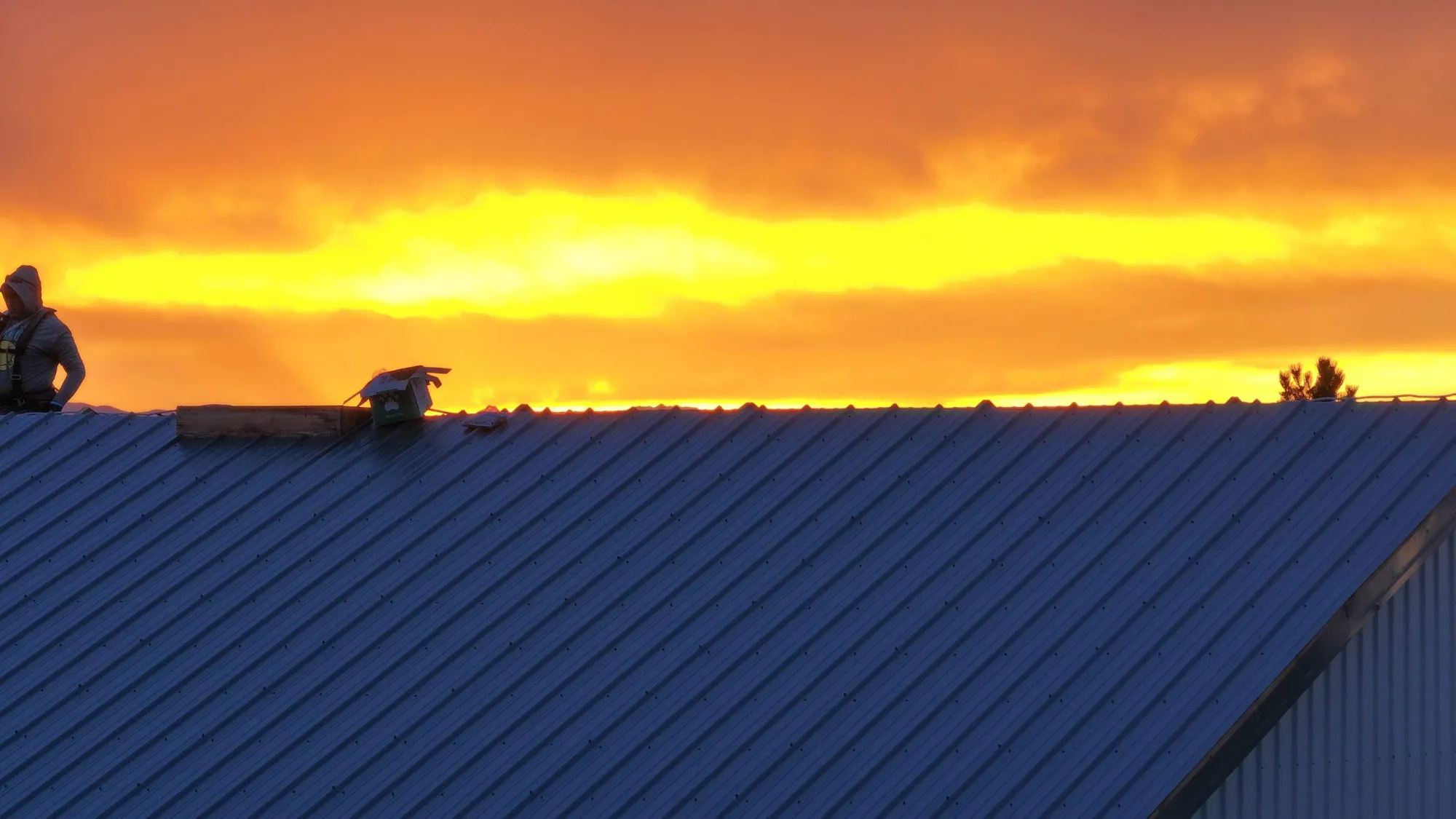Metal Roof at Golden Hour — Red Hawk Roofing project